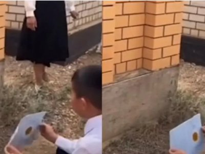 «Сабақты «беске» бітірдім»: Әкесінің қабіріне барған оқушы жұрттың жүрегін елжіретті
